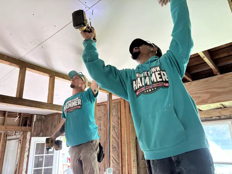 Crew working on a ceiling
